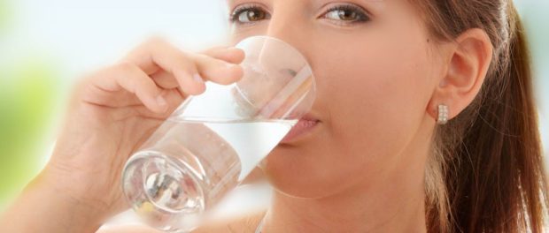 Drinking water glass girl