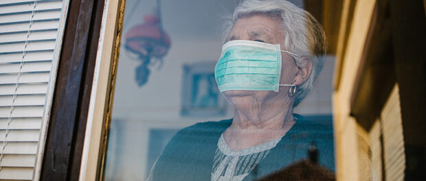 Retired woman wearing a mask